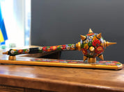 Handmade wooden Ukrainian Bulava, decorated with vibrant floral patterns, traditional mace souvenir for men valuing history and culture.