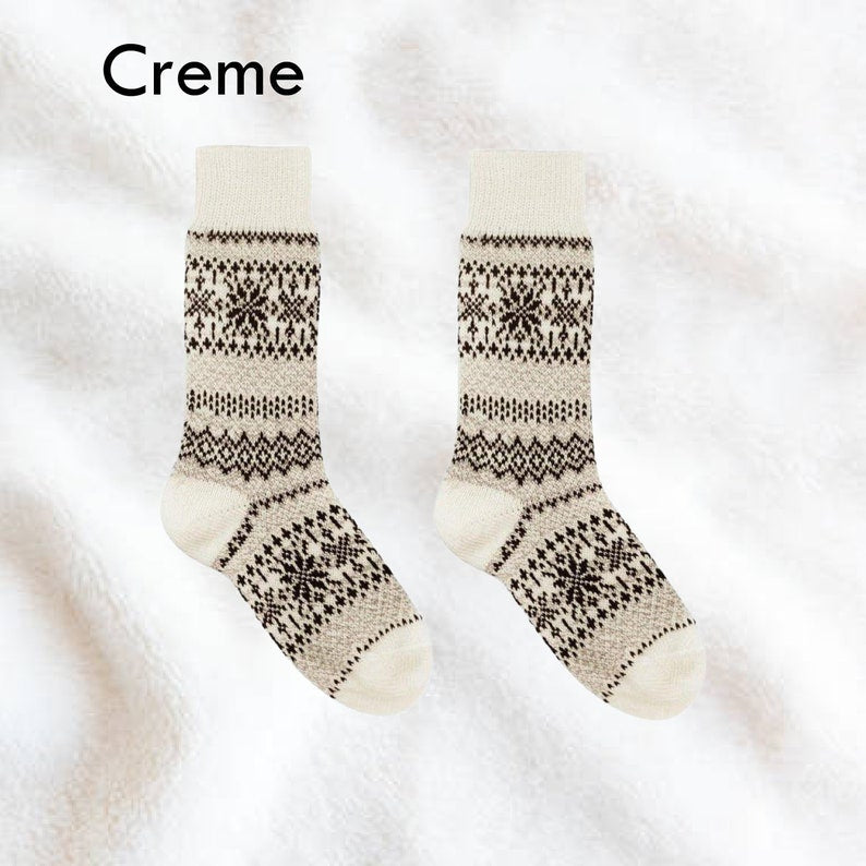 Cream Nordic wool socks with Scandinavian pattern, perfect for winter warmth and comfort for men and women.