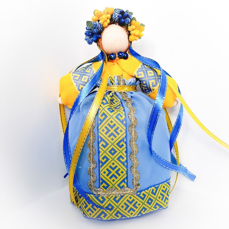 Traditional Ukrainian Motanka Doll Amulet in vibrant blue and yellow, symbolizing peace and protection, perfect housewarming gift.