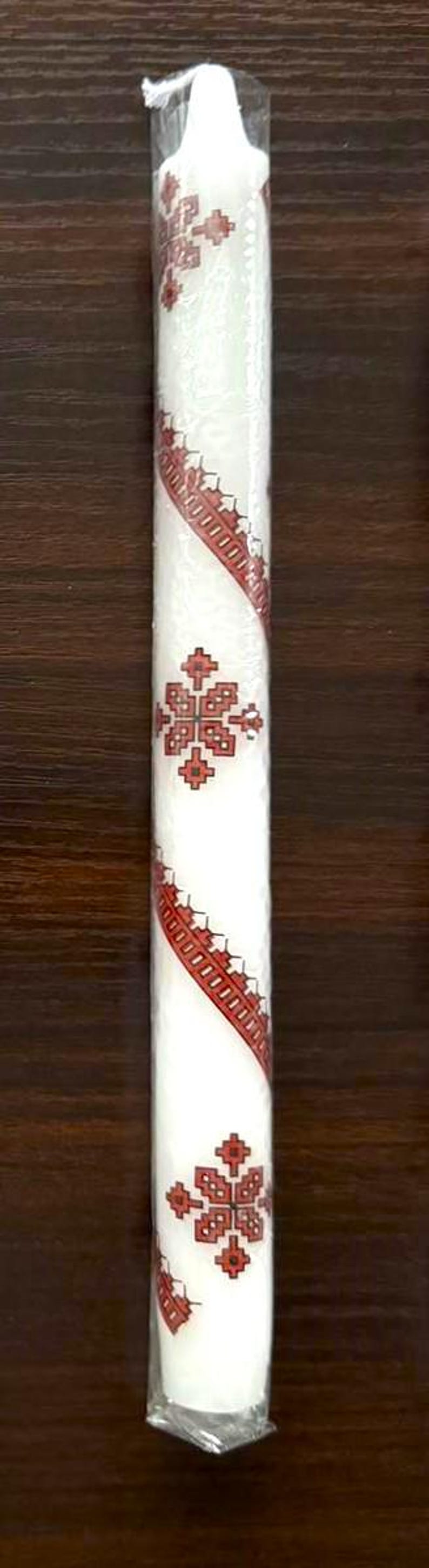 Handmade 10-inch Ukrainian holiday taper candle with red decorative pattern, perfect for Christmas or Easter festive decor.