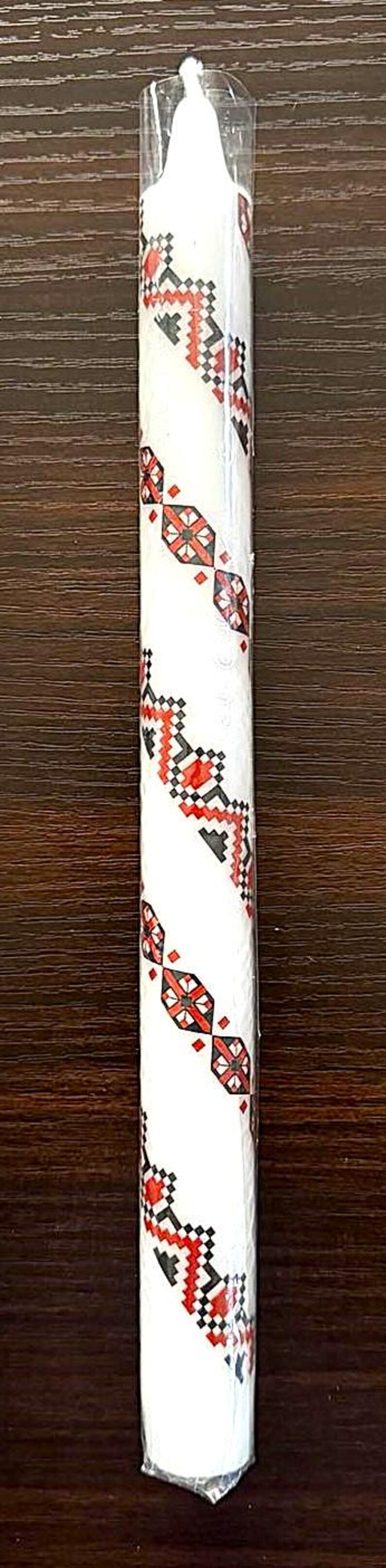 Handmade Ukrainian holiday candle with traditional festive patterns, 10-inch taper for Christmas or Easter decor.