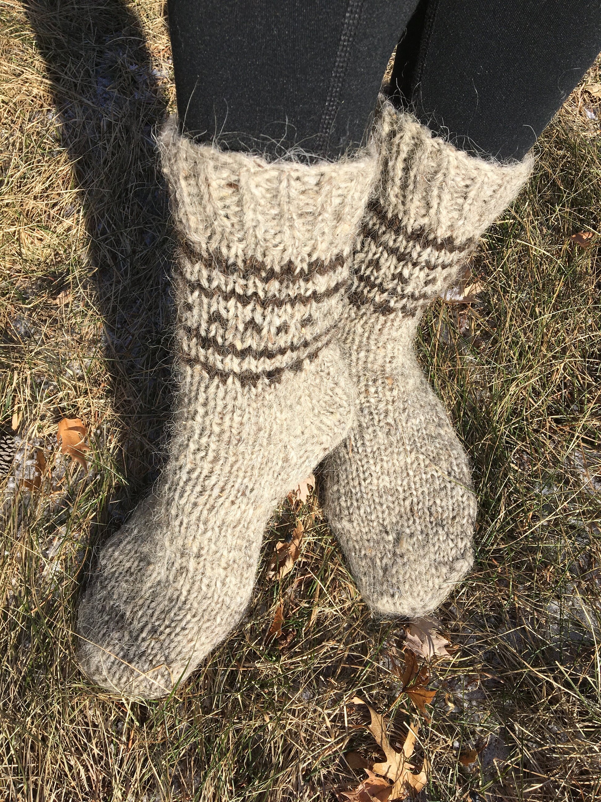 Hand-knitted wool socks in natural colors, unisex design for winter warmth, made from 100% organic sheep wool.