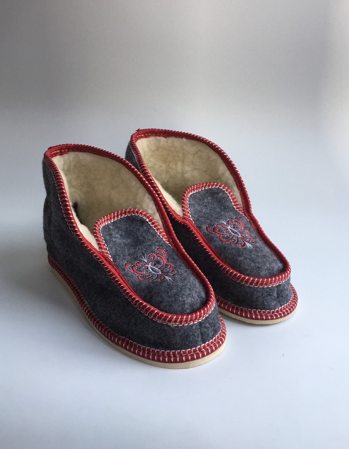 Handmade Carpathian wool slippers with red embroidery, Hutsul Chuni, cozy and traditional Ukrainian Christmas gift.