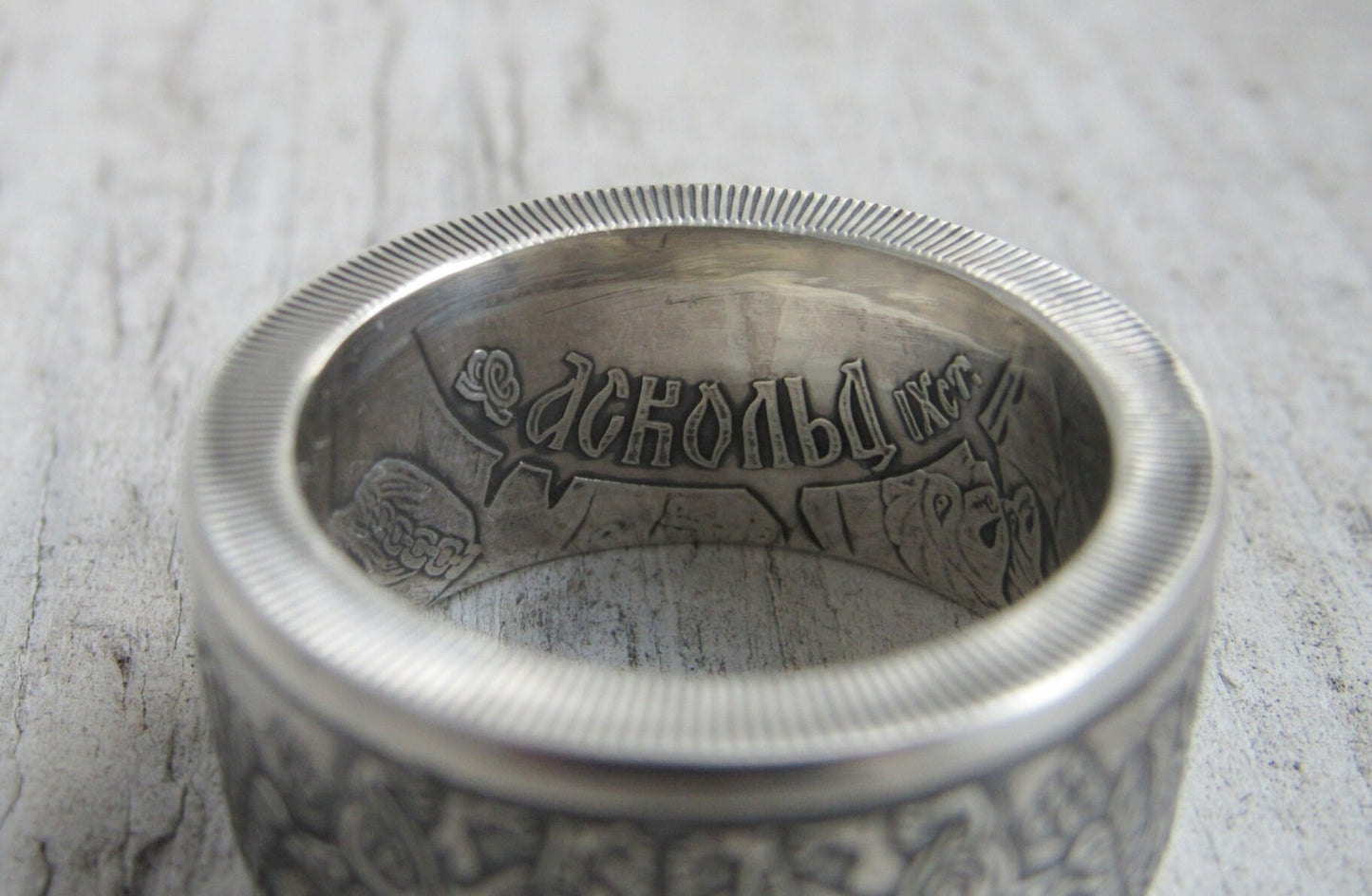 Handcrafted silver ring from Ukrainian coin featuring Prince Askold design, showcasing intricate cultural craftsmanship.