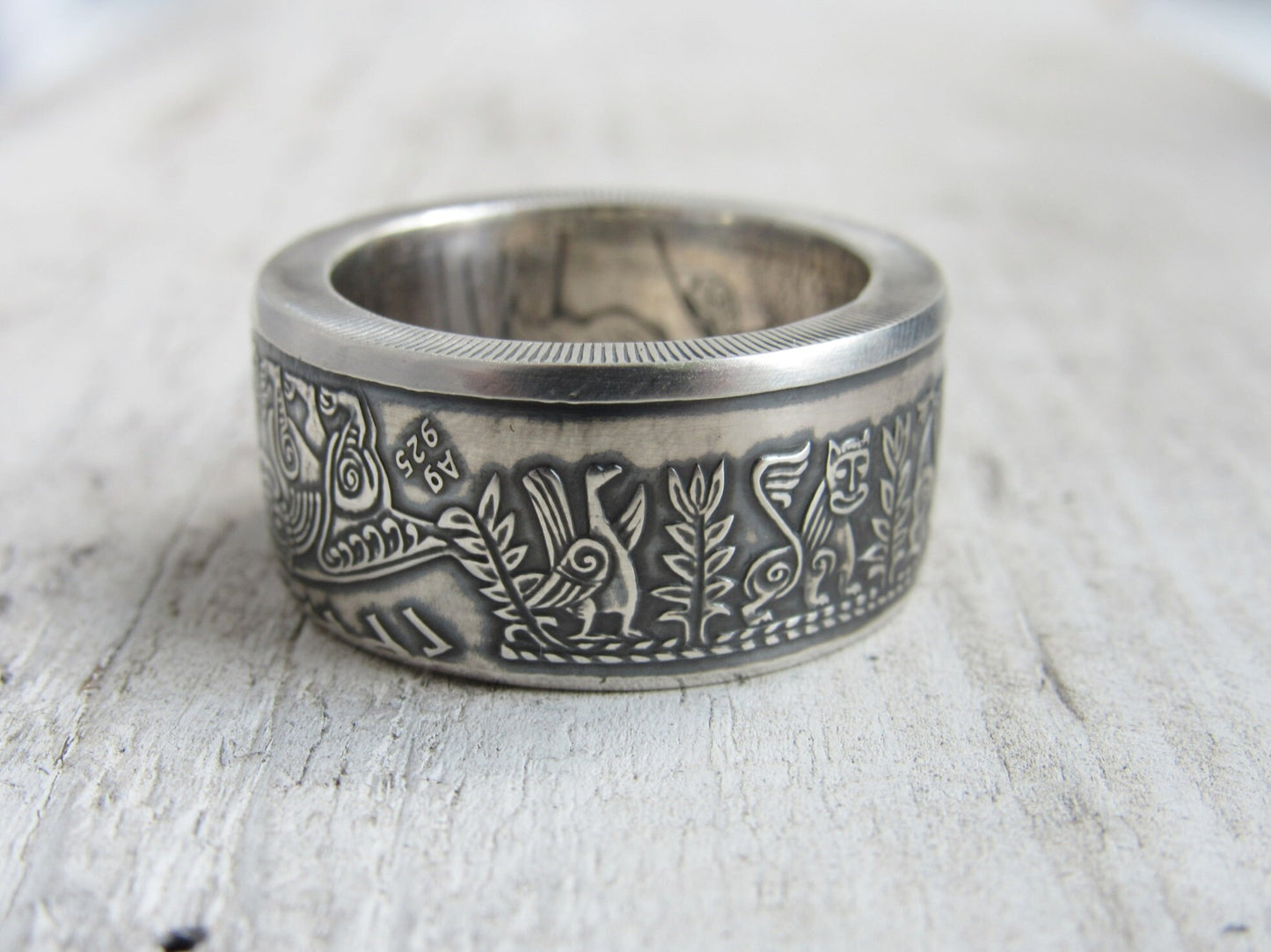 Handcrafted silver ring made from a 1999 Ukrainian coin with Kyivan Rus design, celebrating Prince Askold's heritage.