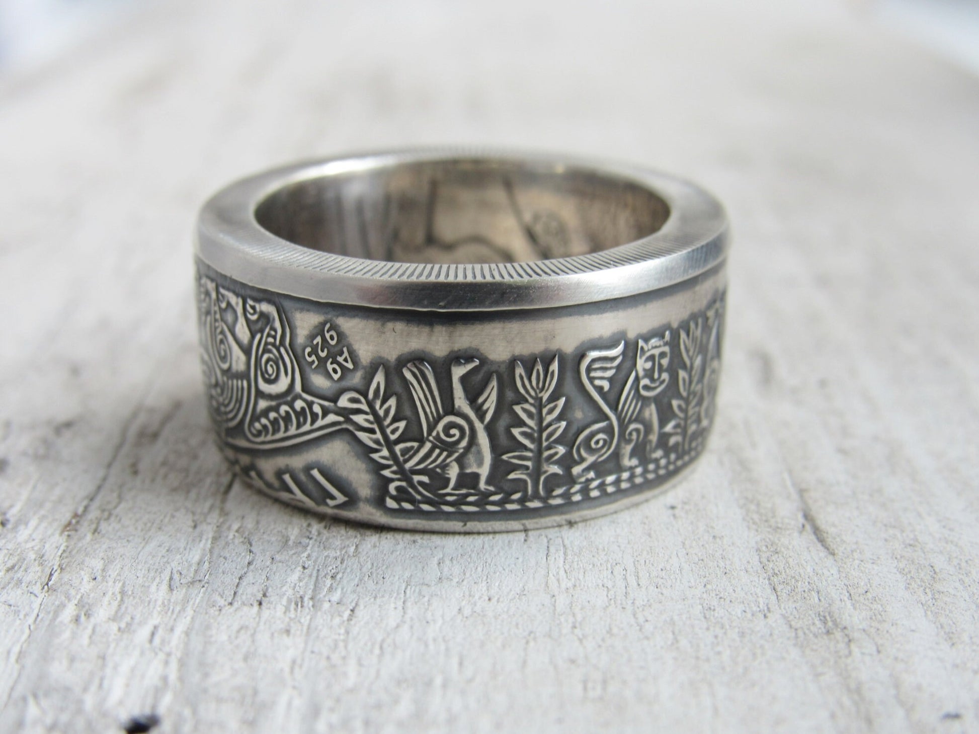 Handcrafted silver ring made from a 1999 Ukrainian coin with Kyivan Rus design, celebrating Prince Askold's heritage.