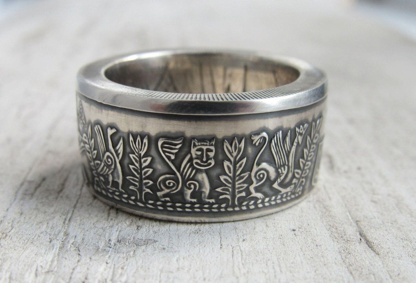 Handcrafted Ukrainian ring with Kyivan Rus design, made from 925 silver coin, commemorating Prince Askold. Unique cultural souvenir.