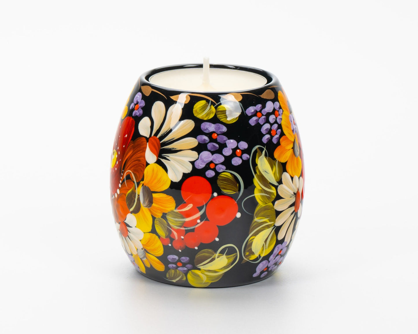 Hand painted Ukrainian tea light holder with Petrykivka floral design in vibrant colors.