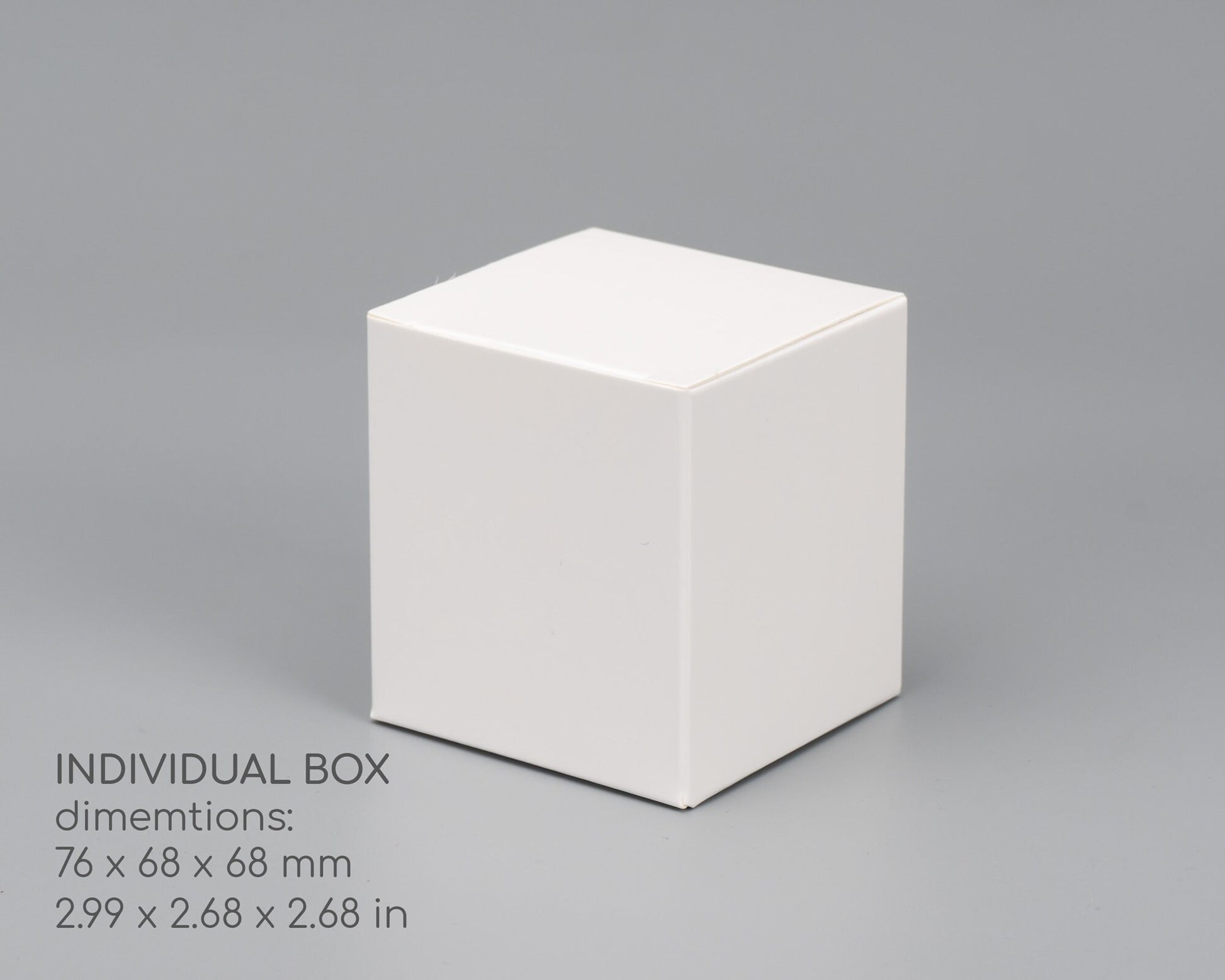 White individual packaging box with dimensions 76 x 68 x 68 mm for the Ukrainian tea light candle holder.