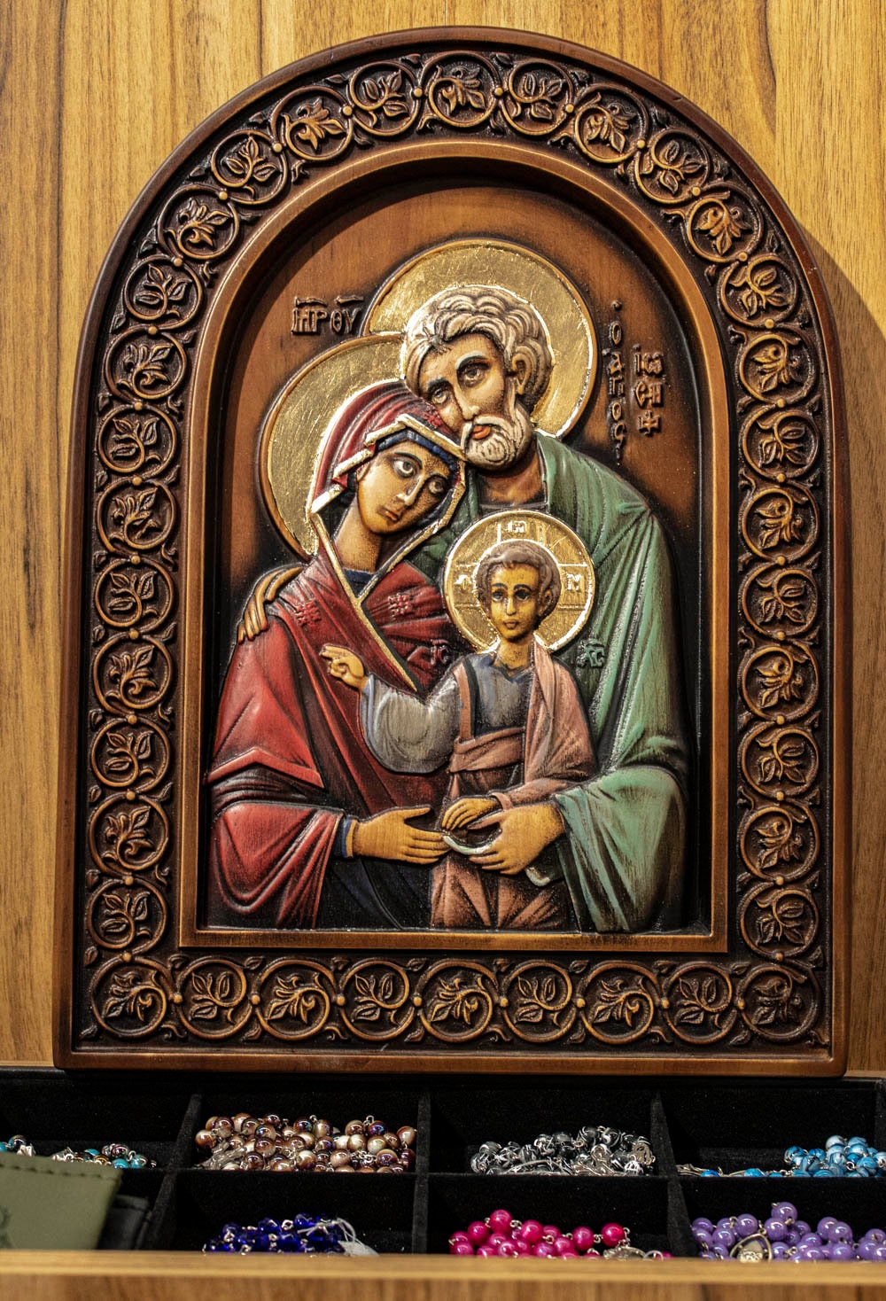 Handcrafted wooden icon of the Holy Family, Byzantine Christian art, Ukrainian religious gift, unique hand-carved design.