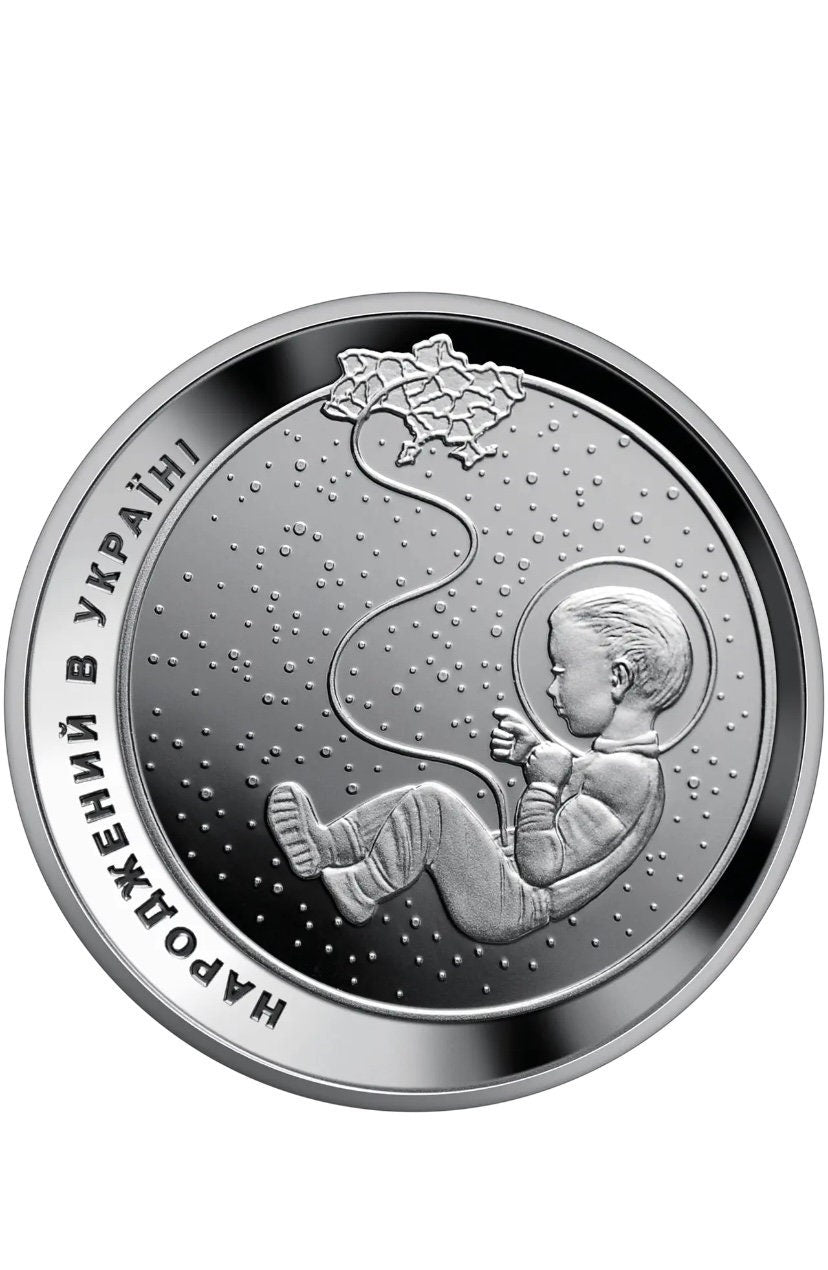 2023 Ukrainian Commemorative Silver Coin featuring child and leaf motif, part of the "Nationalities in Ukraine" Collector's Edition.