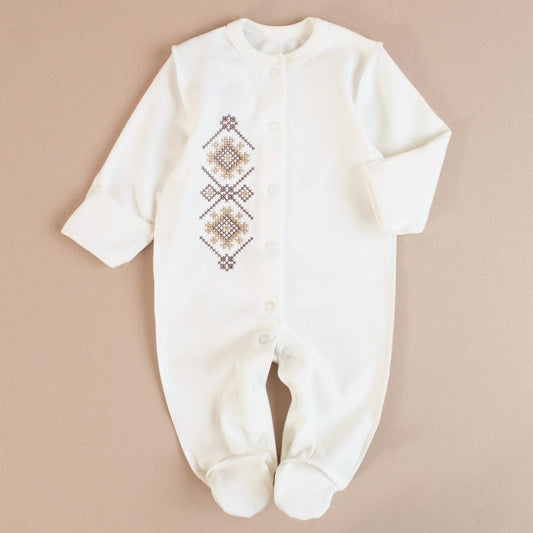 Ukrainian embroidered baby romper with beige-brown traditional patterns, perfect for newborns as a coming-home outfit or baby shower gift.