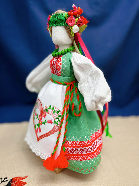 Handmade Ukrainian Motanka Doll "Spring Bride" in traditional attire with vibrant embroidery, a cultural guardian for home and prosperity.