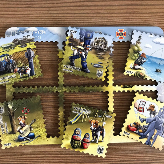 Wooden fridge magnets set featuring Ukrainian postage stamps of Patron dog, symbol of courage and loyalty.