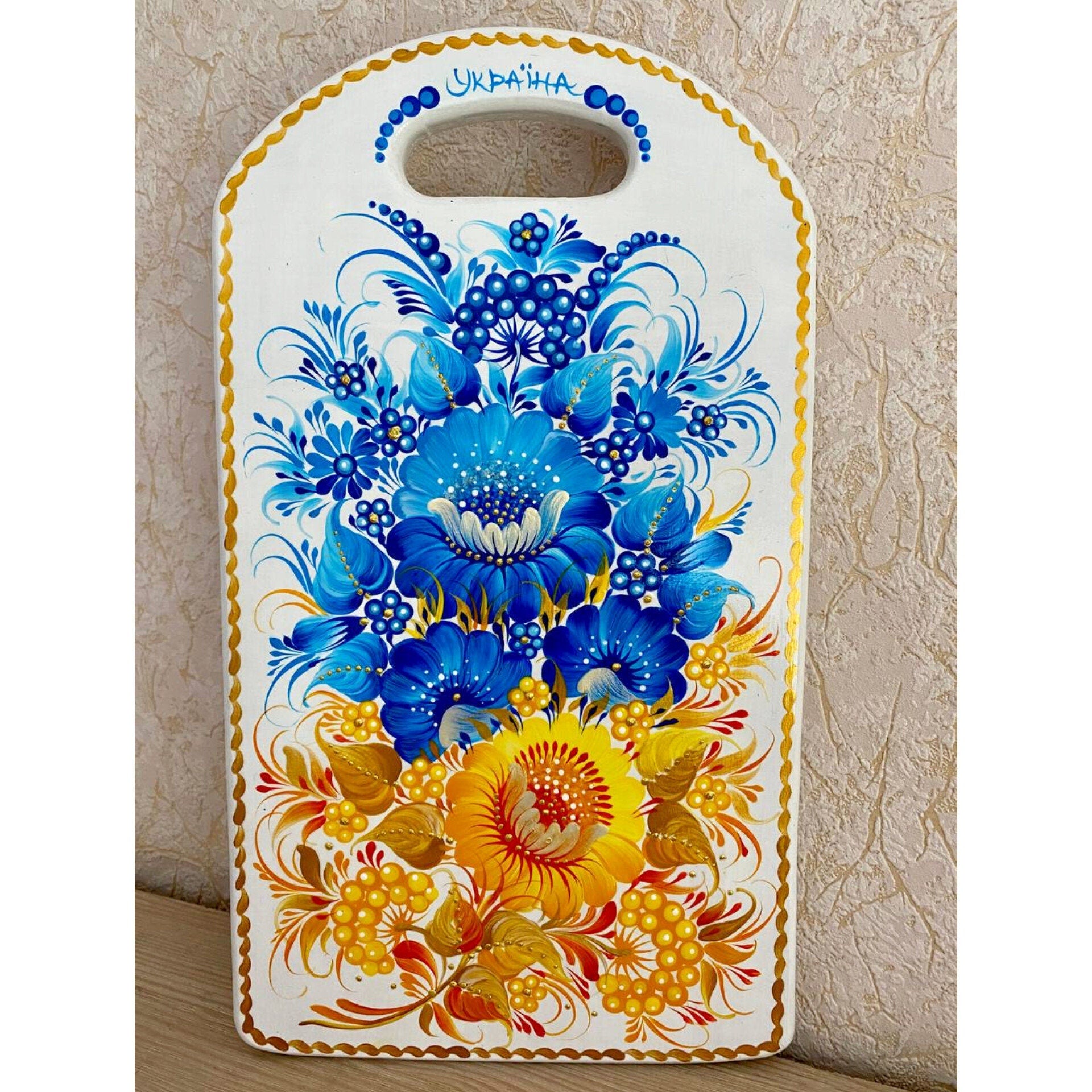 Hand-painted wooden cutting board with yellow-blue floral Petrykivka design, Ukrainian kitchen decor, unique gift.