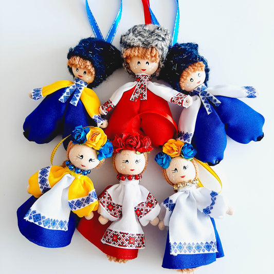 Handmade Ukrainian folk dolls in traditional clothing for holiday decor and gifts.