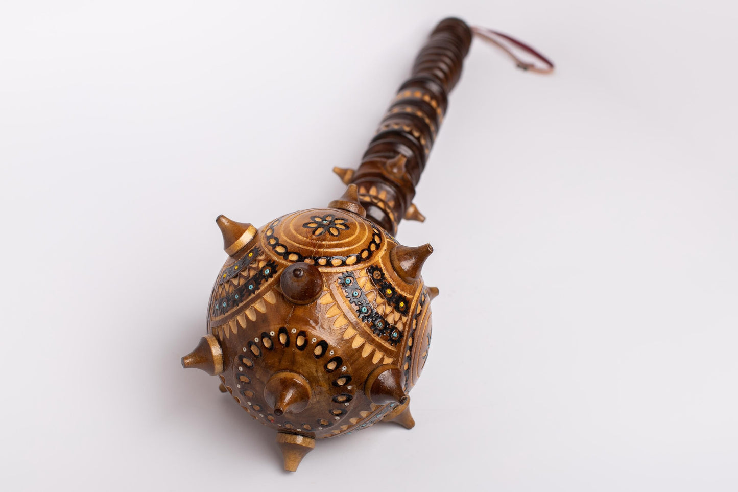 Hand-carved Ukrainian wooden mace, ornate Bulava souvenir, symbolizing strength and leadership, perfect decorative gift for men.