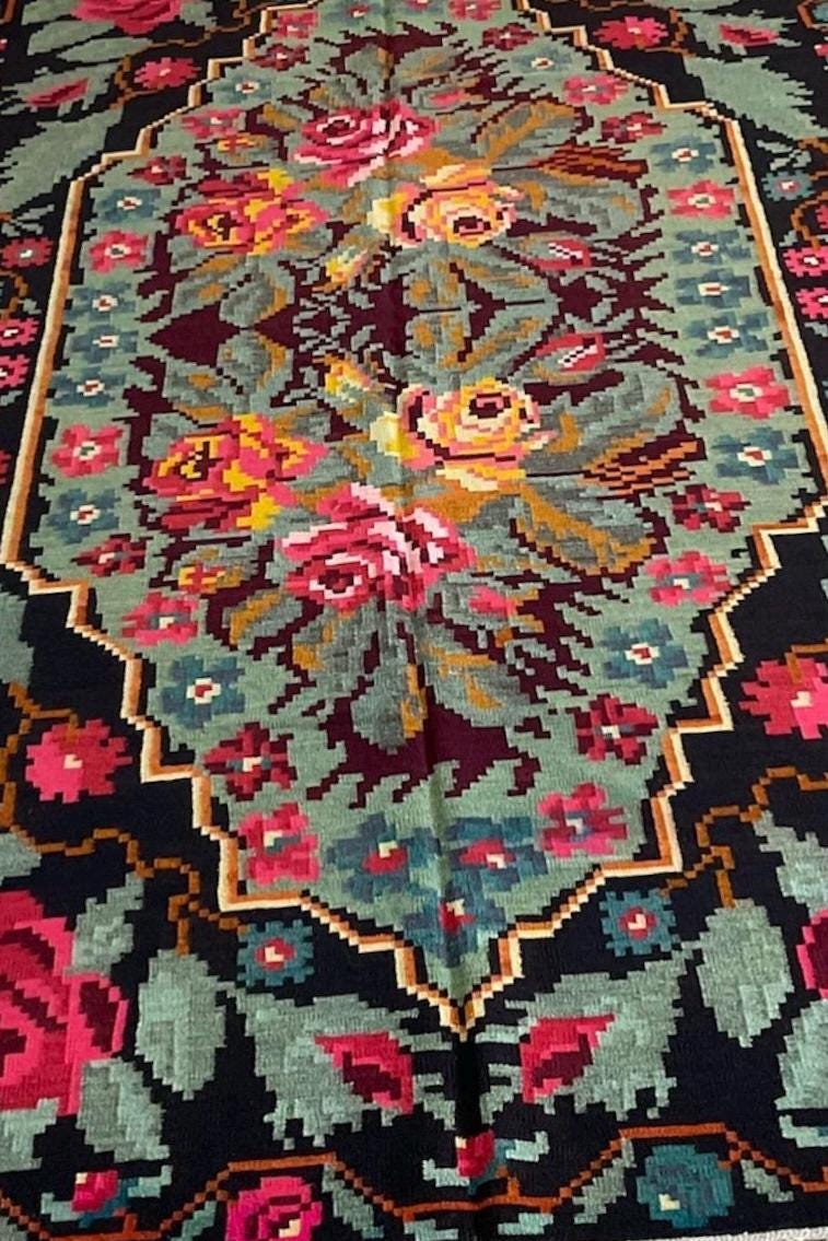 Vintage Moldovan black-green floral Kilim rug with vibrant roses, handwoven wool antique from 1970s Bessarabian collection.