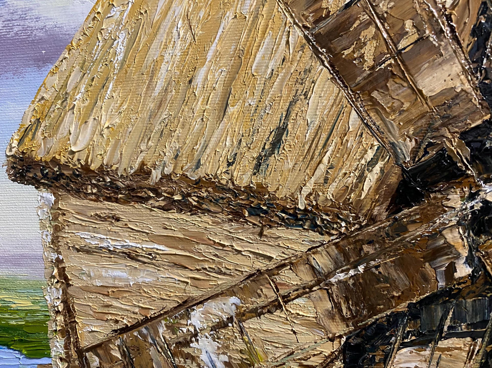 Close-up of textured oil painting showing an old Ukrainian windmill, highlighting the rustic details and serene rural landscape.