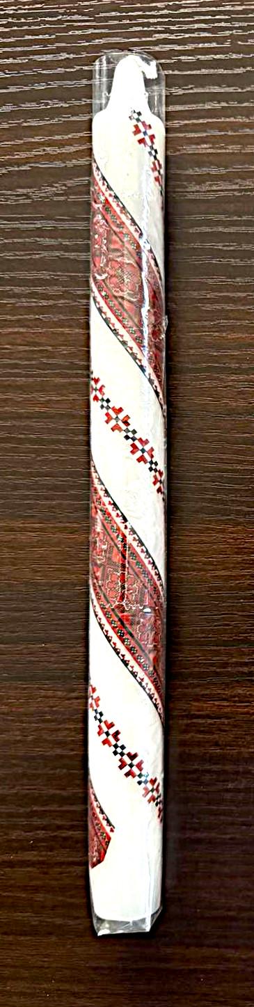 Handmade Ukrainian holiday candle with red and white traditional design, 10" taper for Christmas or Easter decor.