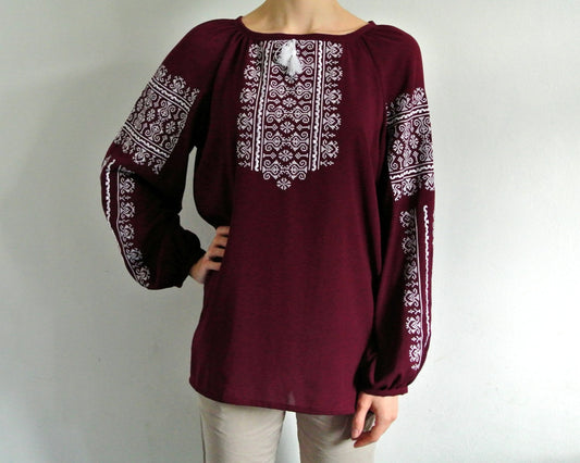 Marsala boho blouse with white geometric embroidery, traditional Ukrainian Vyshyvanka design, long sleeves, bohemian style.