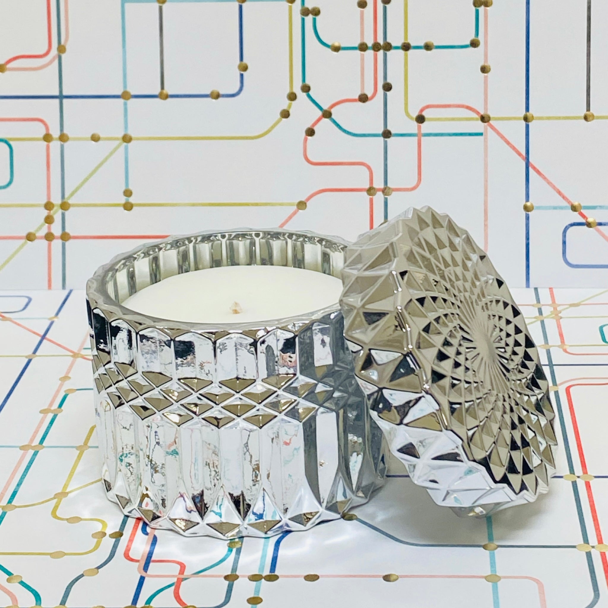 Cafe Night scented candle in a reusable decor jar, inspired by Le Labo Benjoin 19, with intricate geometric design and lid.