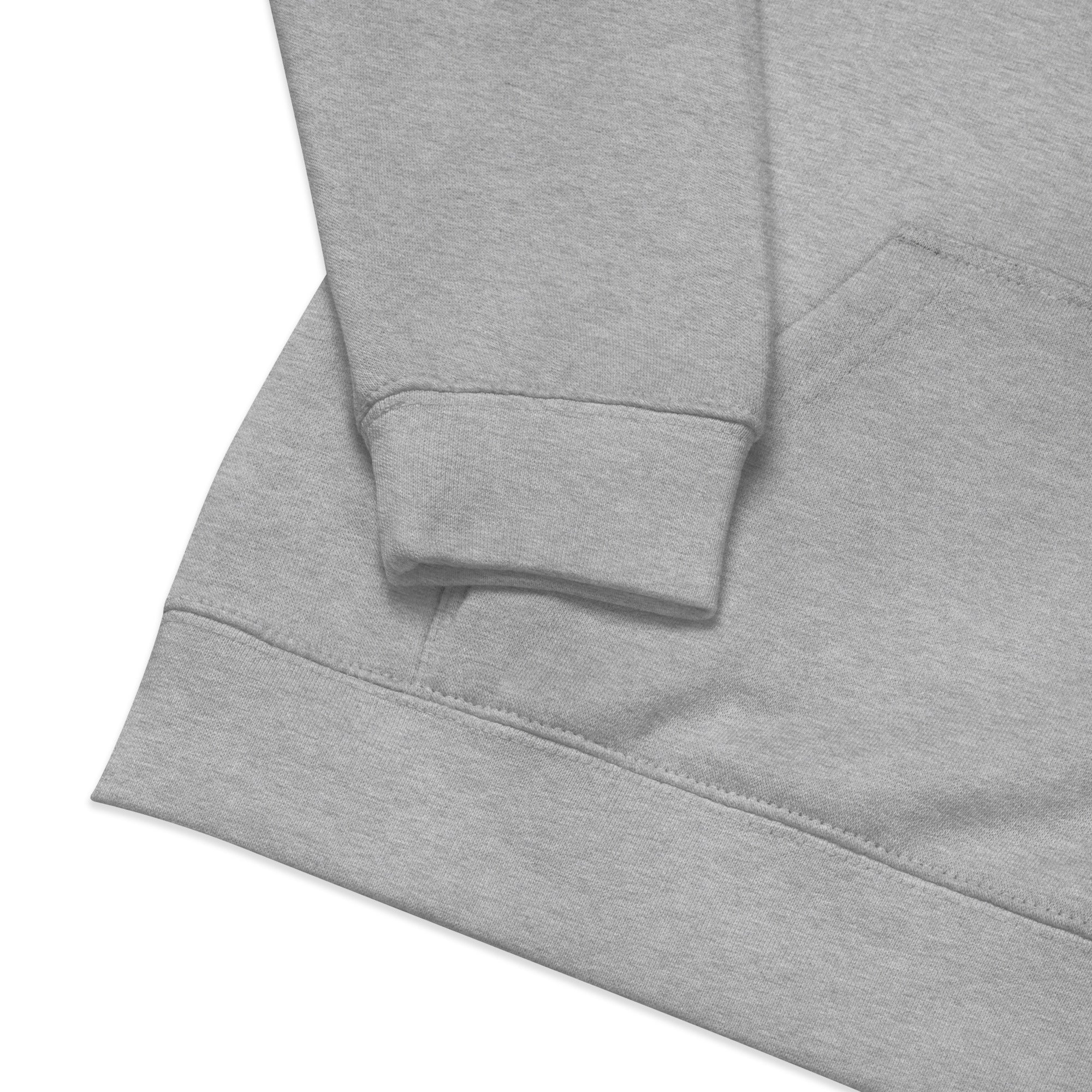 Gray kids fleece hoodie with elastic cuffs and waistband, highlighting soft and durable material for comfort and long-lasting wear.