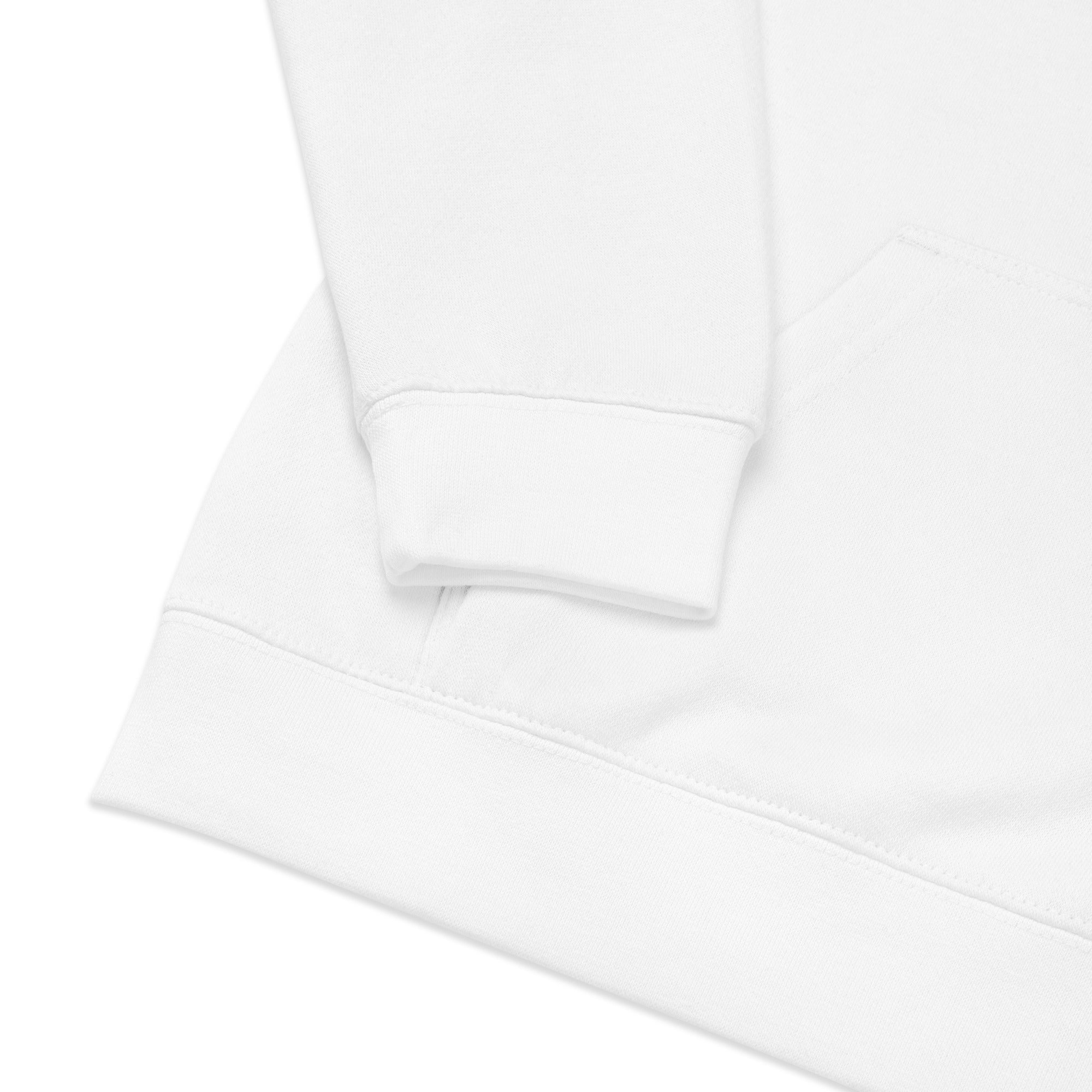Close-up of kids white fleece hoodie sleeve and pocket showing craftsmanship and soft texture.