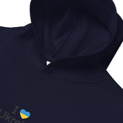 Kids fleece hoodie with "I Love Ukraine" design and soft fabric, featuring durable material and elastic cuffs for cozy adventures.