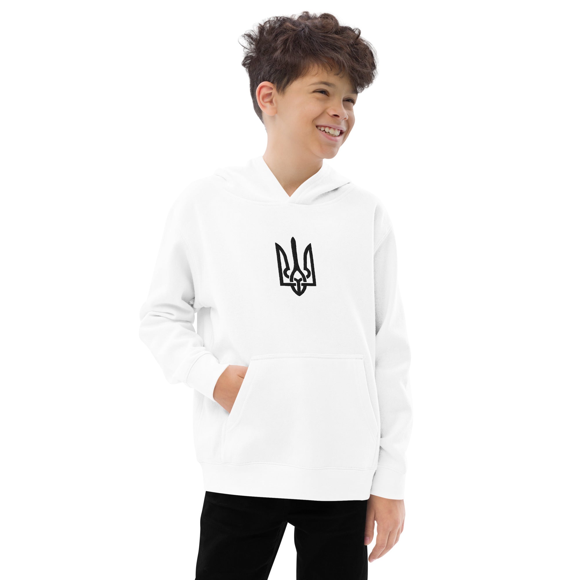 Child wearing white kids fleece hoodie with Ukrainian Tryzub design, smiling confidently.