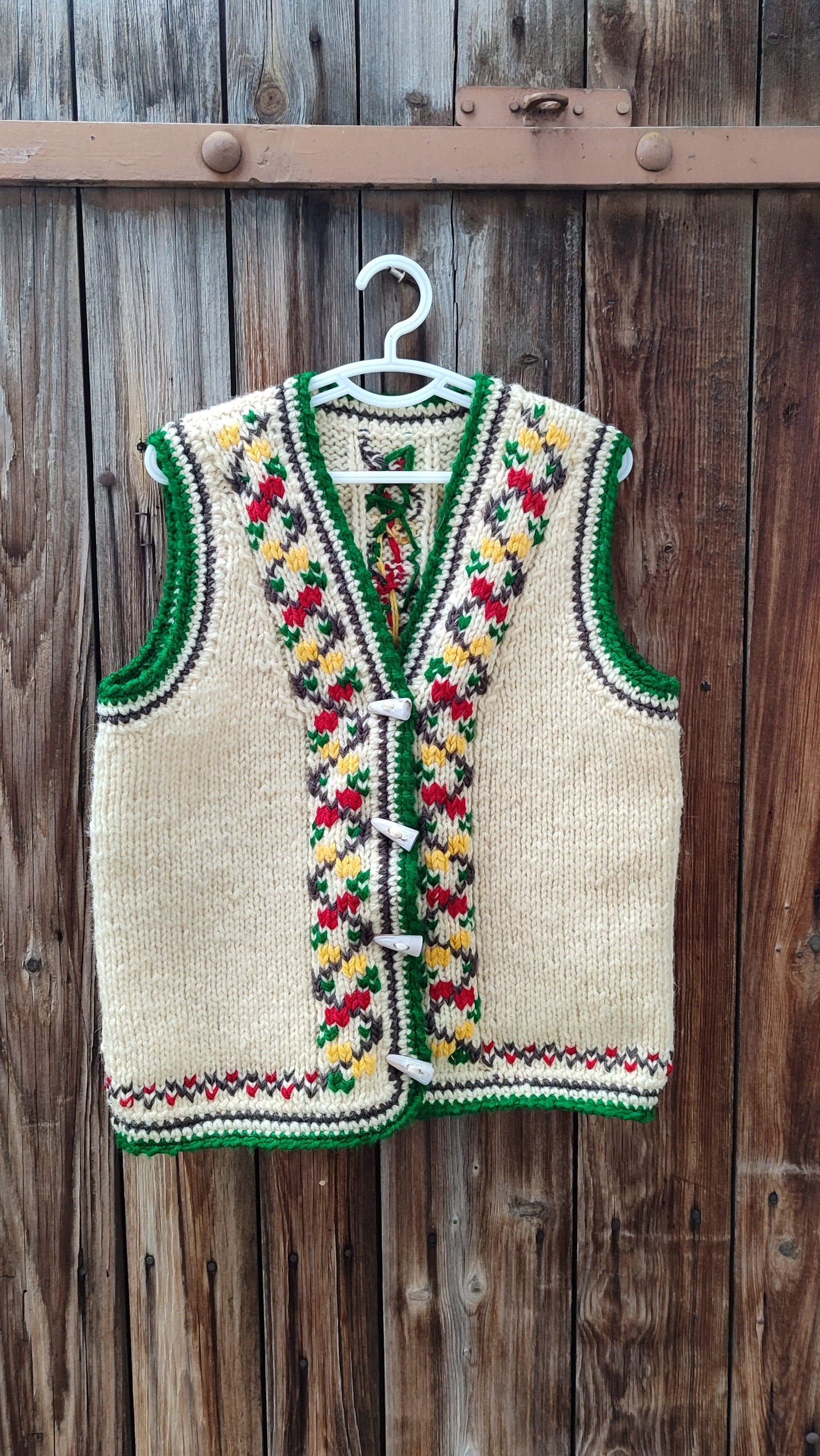 Knitted folk vest for kids, unisex sleeveless cardigan with colorful embroidery, made from 100% sheep wool, for ages 7-8 years