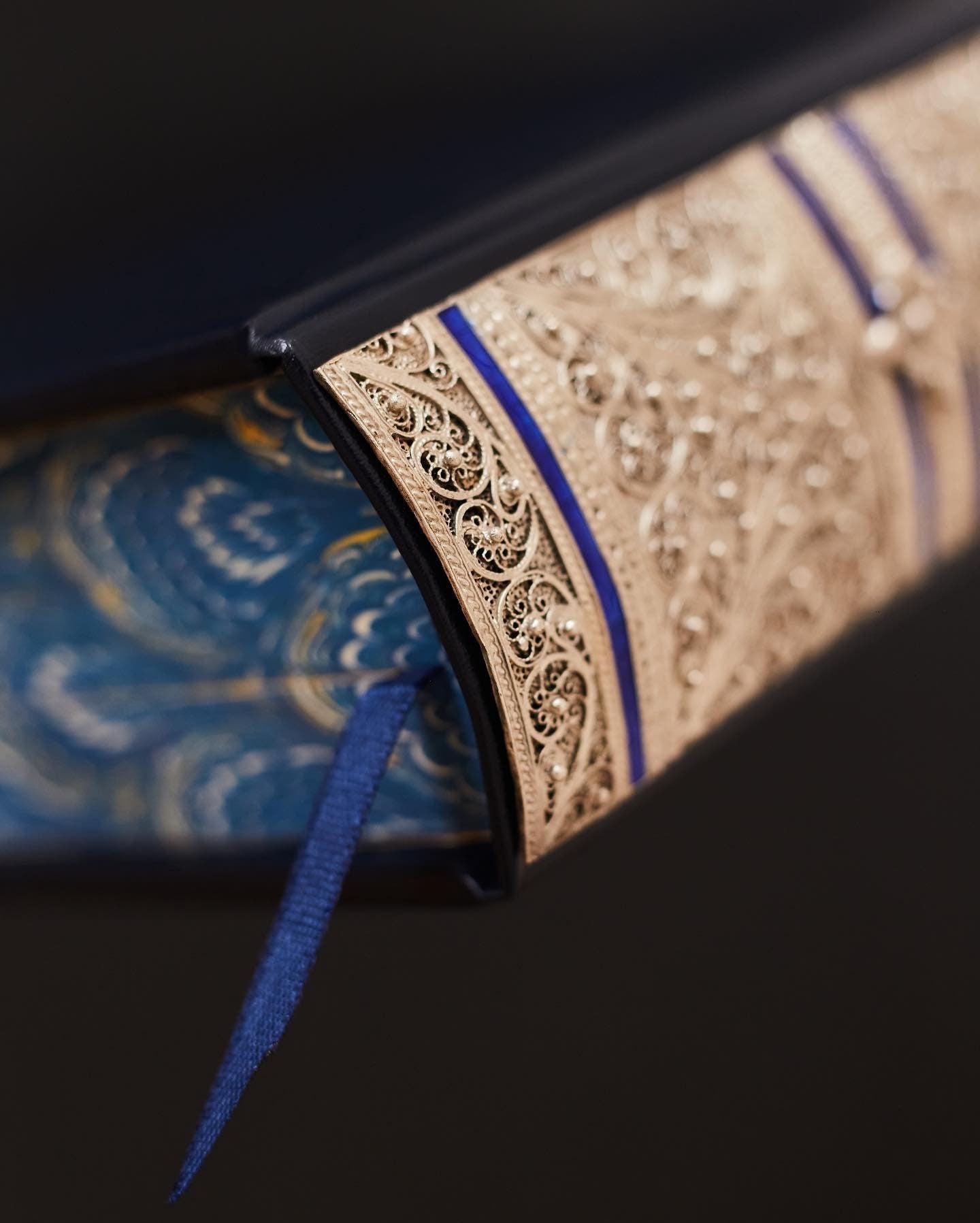 Exquisite leather binding of "Kobzar" by Taras Shevchenko with decorative gilding and blue ribbon bookmark, luxury edition.
