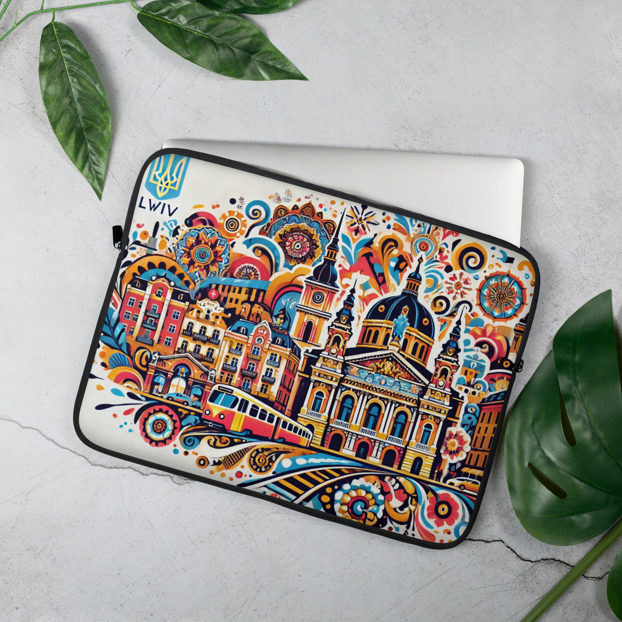 Lviv Folk Art Laptop Sleeve with Tryzub, colorful design, water-resistant case, neoprene, protecting a laptop on a table.