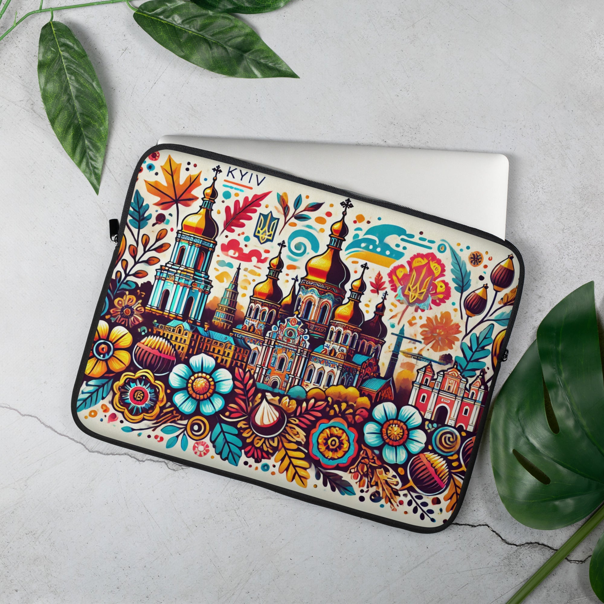 Kyiv folk art laptop sleeve with vibrant floral and Tryzub design, featuring water-resistant neoprene and soft faux fur lining.