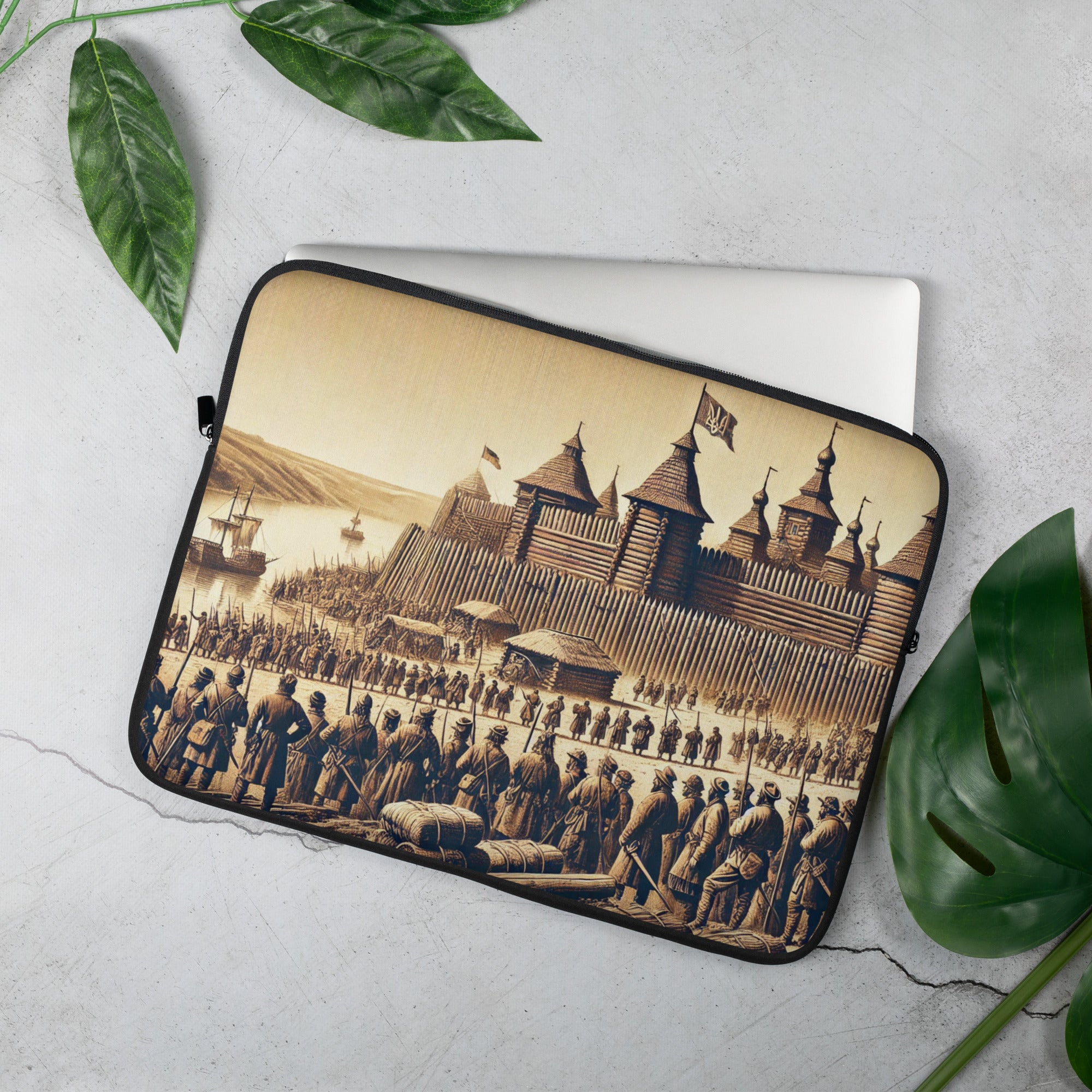 Ukrainian Cossack Fort laptop sleeve showcasing intricate motif, with water-resistant neoprene for laptops, on a white surface with leaves.