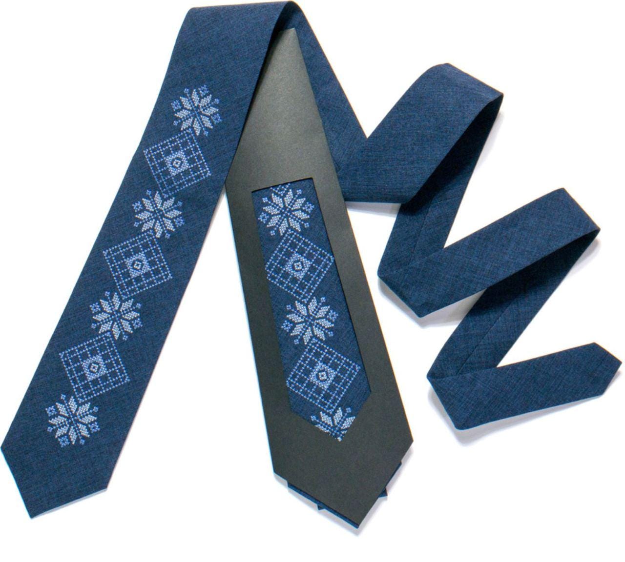 Men's blue embroidered tie with Ukrainian folk design, ideal gift for weddings or formal events.