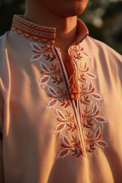 Close-up of men's embroidered Vyshyvanka shirt with intricate Ukrainian design, perfect for special occasions.