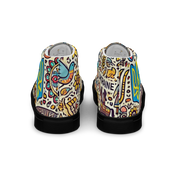 High top canvas shoes with vibrant Ukrainian symbolic design, featuring a bold faux leather toe cap and comfortable padded collar.