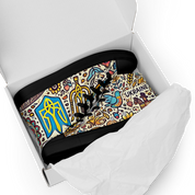 High top canvas shoes with Ukrainian symbolic design in an open box, showcasing bold colors and patterns.