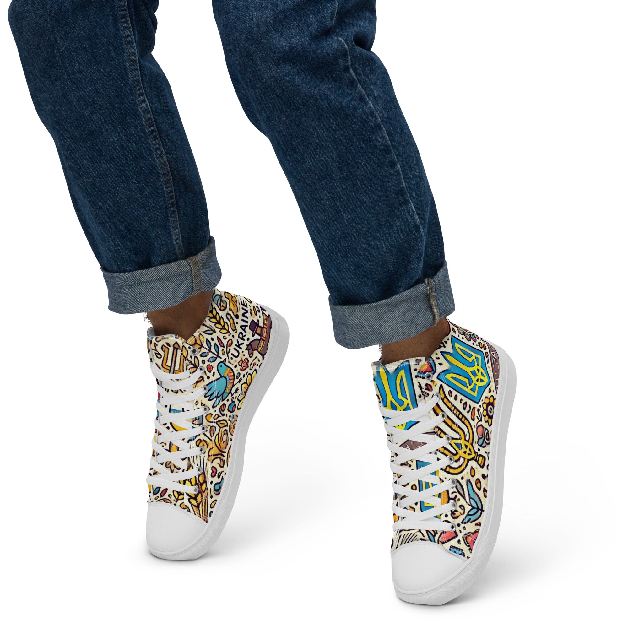 High top canvas shoes with Ukrainian design and faux leather toe cap, worn with rolled-up jeans for a stylish look.
