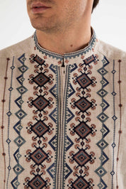 Men's linen shirt with Ukrainian folk embroidery, traditional vyshyvanka pattern, stand-up collar detail.