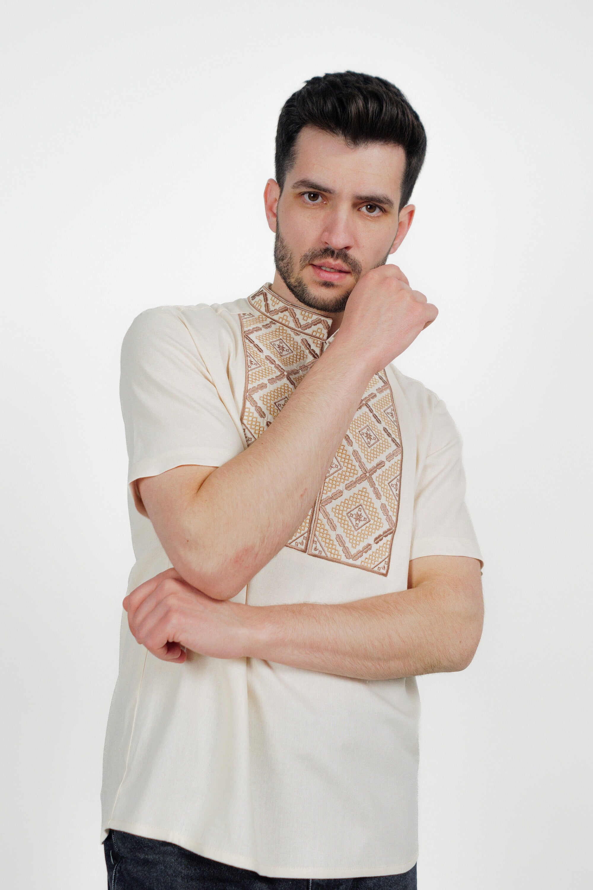 Men's short sleeve linen Ukrainian embroidered shirt with geometric pattern, perfect for cultural events and everyday wear.
