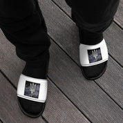 Black men's Pidkradyli sandals with Ukrainian Tryzub emblem, sleek slip-on design, modern and comfortable for indoor and outdoor use.