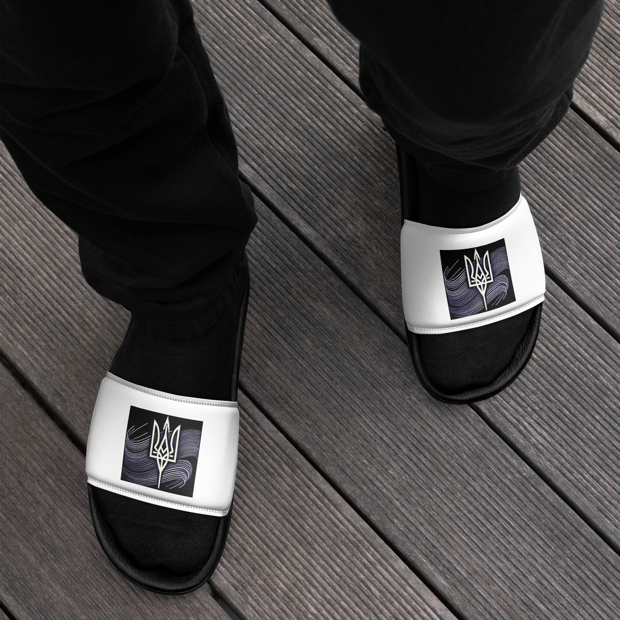 Black men's Pidkradyli sandals with Ukrainian Tryzub emblem, sleek slip-on design, modern and comfortable for indoor and outdoor use.