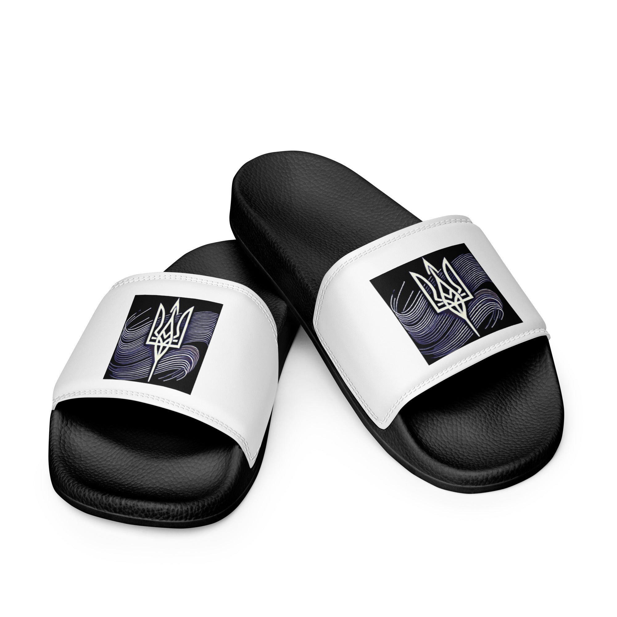Black and white men's slip-on sandals with Ukrainian Tryzub emblem, designed for comfort and style, perfect for casual wear.