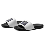 Black and white 'Pidkradyli' slip-on sandals with Tryzub emblem, comfortable and modern design for casual wear.