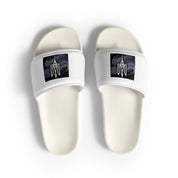 White 'Pidkradyli' slip-on sandals with Ukrainian Tryzub emblem, featuring a sleek black and white design for modern style and comfort.