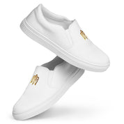 Gold Ukrainian Trizub slip-on canvas shoes with white rubber outsole and elastic accents for comfort and durability.