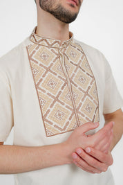 Men's short sleeve Ukrainian vyshyvanka shirt in linen with geometric embroidery pattern.
