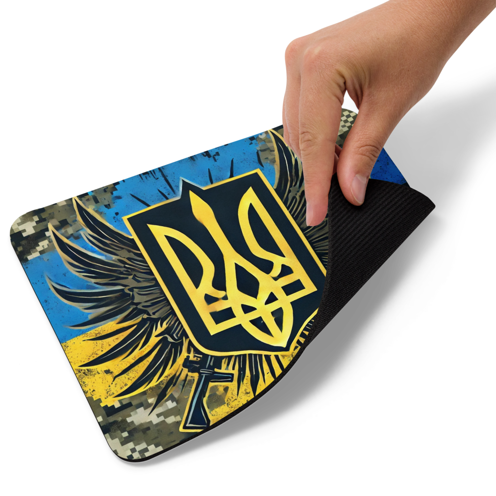 Ukrainian military mousepad featuring camouflage, Tryzub emblem, and flag, with non-slip base for gaming and desk use.